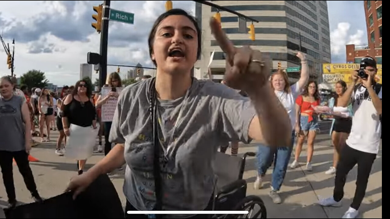 ANGRY MOB OF ABORTION PROTESTORS BECOME HOSTILE (PREACHER ASSAULTED & SIGN STOLEN) COPS JUST WATCH