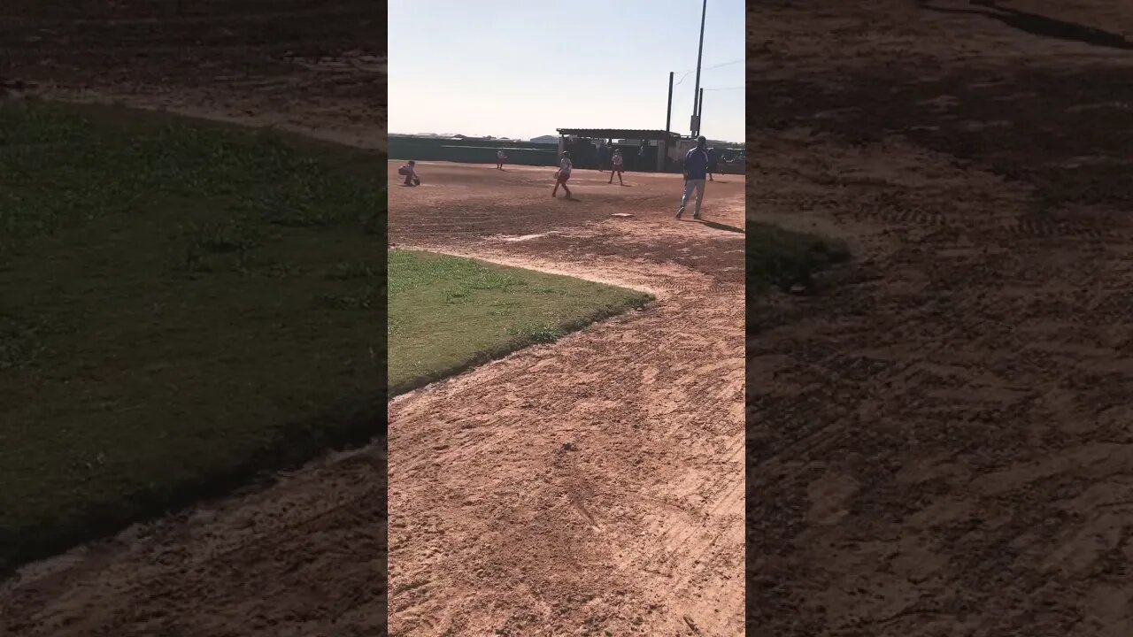 Watch the stretch by 8-year-old to get the OUT!!!