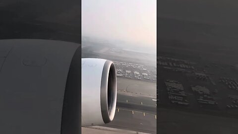 Emirates B77W - low visibility/ hazy day departure