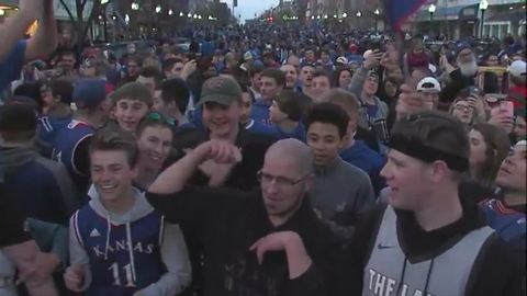 Fans chant Rock Chalk in Lawrence