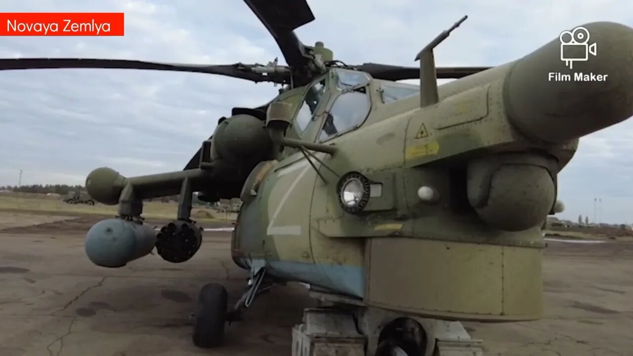 Russian Mi-28N attack helicopter firing rockets on Ukrainian military concentration