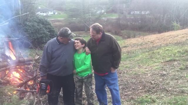 Two Men And A Boy Pose For The Family Photo…With A Twist