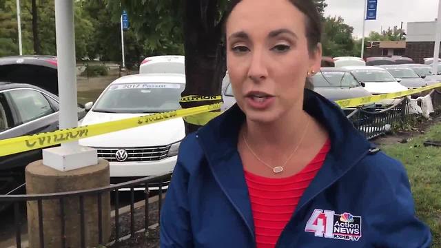 Cars at a Volkswagen dealership are totaled from flash flooding