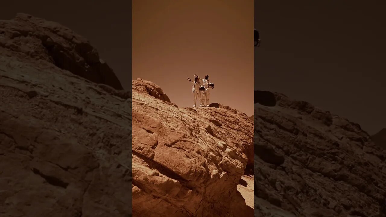 Astronauts Looking Around in a Desolate Area