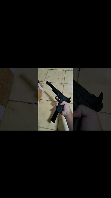Glock 17 gen 4 with elongated barrel, silencer and increased magazine