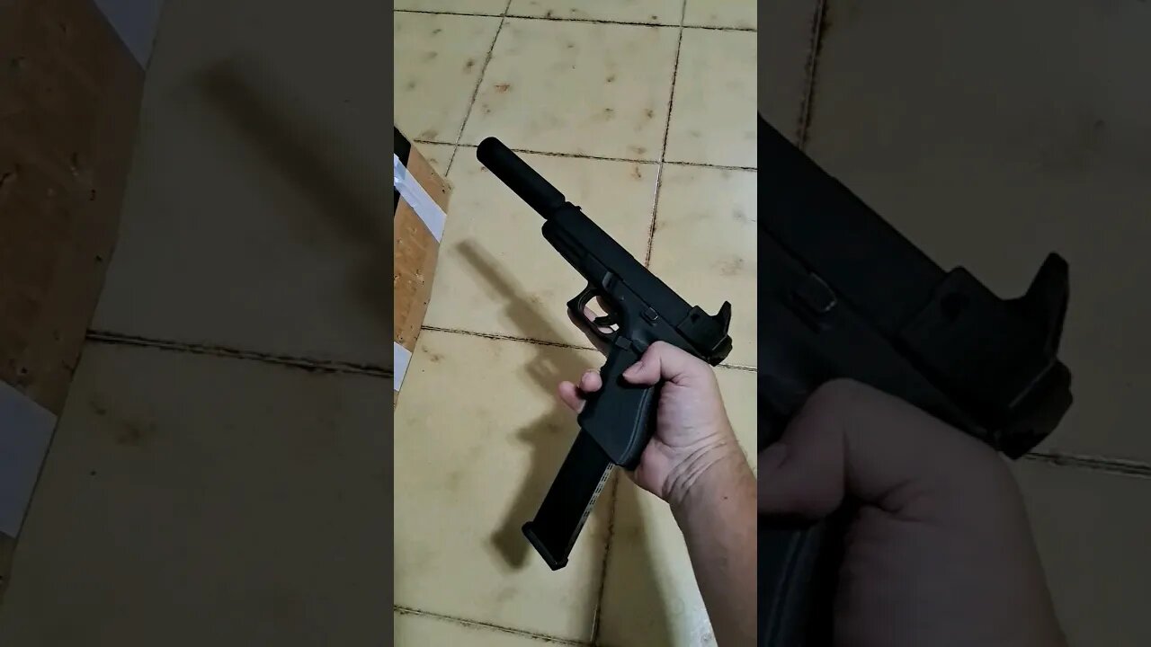 Glock 17 gen 4 with elongated barrel, silencer and increased magazine