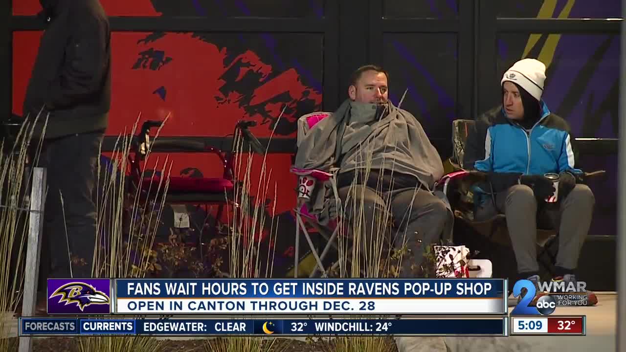 Hundreds wait in line for grand opening of Ravens pop-up shop