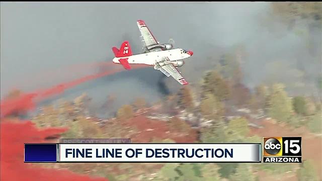 Woman's cabin survives flames from Goodwin Fire