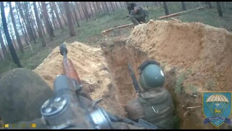 A sniper of the Pskov paratroopers works in a forest belt near Kremennaya