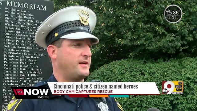 VIDEO: CPD officer and citizen save motorcyclist's life after fiery crash