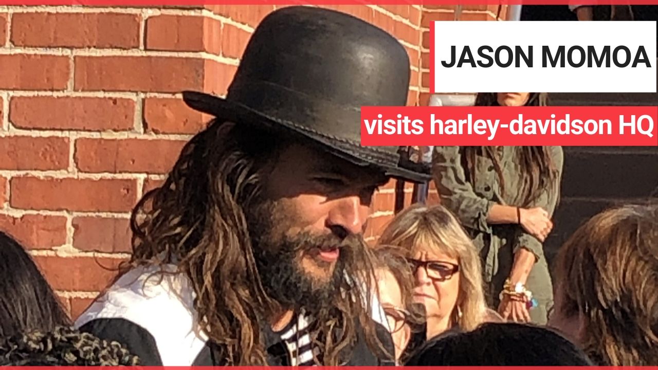 Jason Momoa very enthusiastically greeting workers at the Harley-Davidson HQ