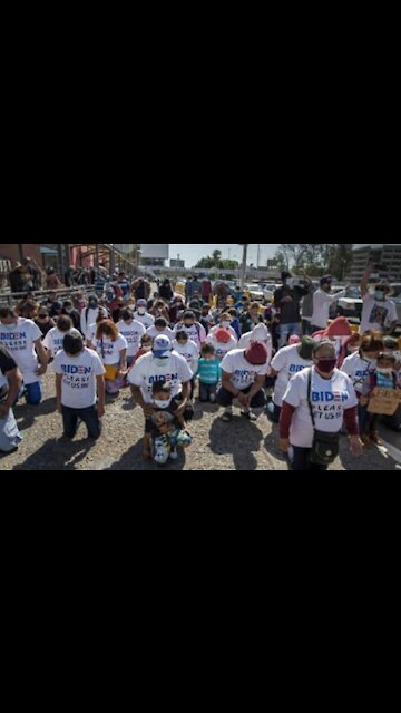 Illegal aliens arrive at the border wearing 'Biden Let Us In' shirts