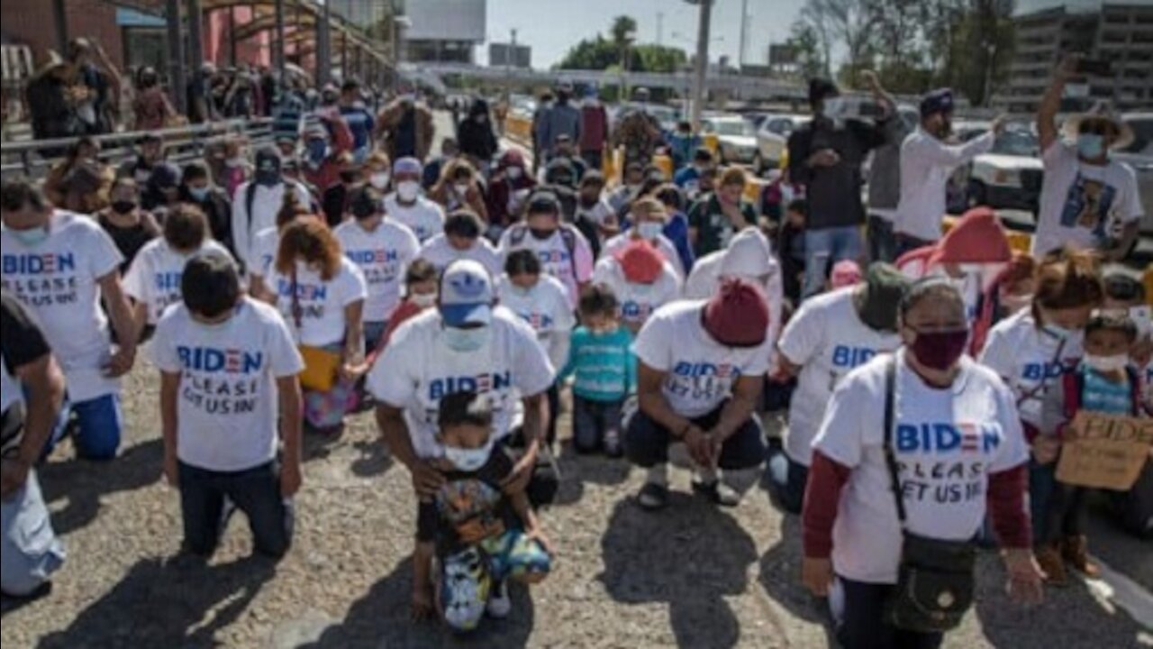 Illegal aliens arrive at the border wearing 'Biden Let Us In' shirts