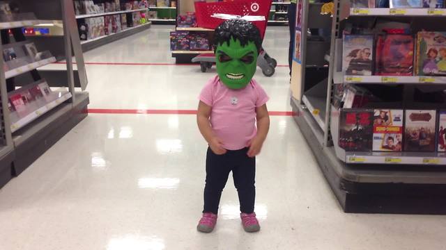 Toddler Girl Runs Around A Store Wearing A Hulk Mask