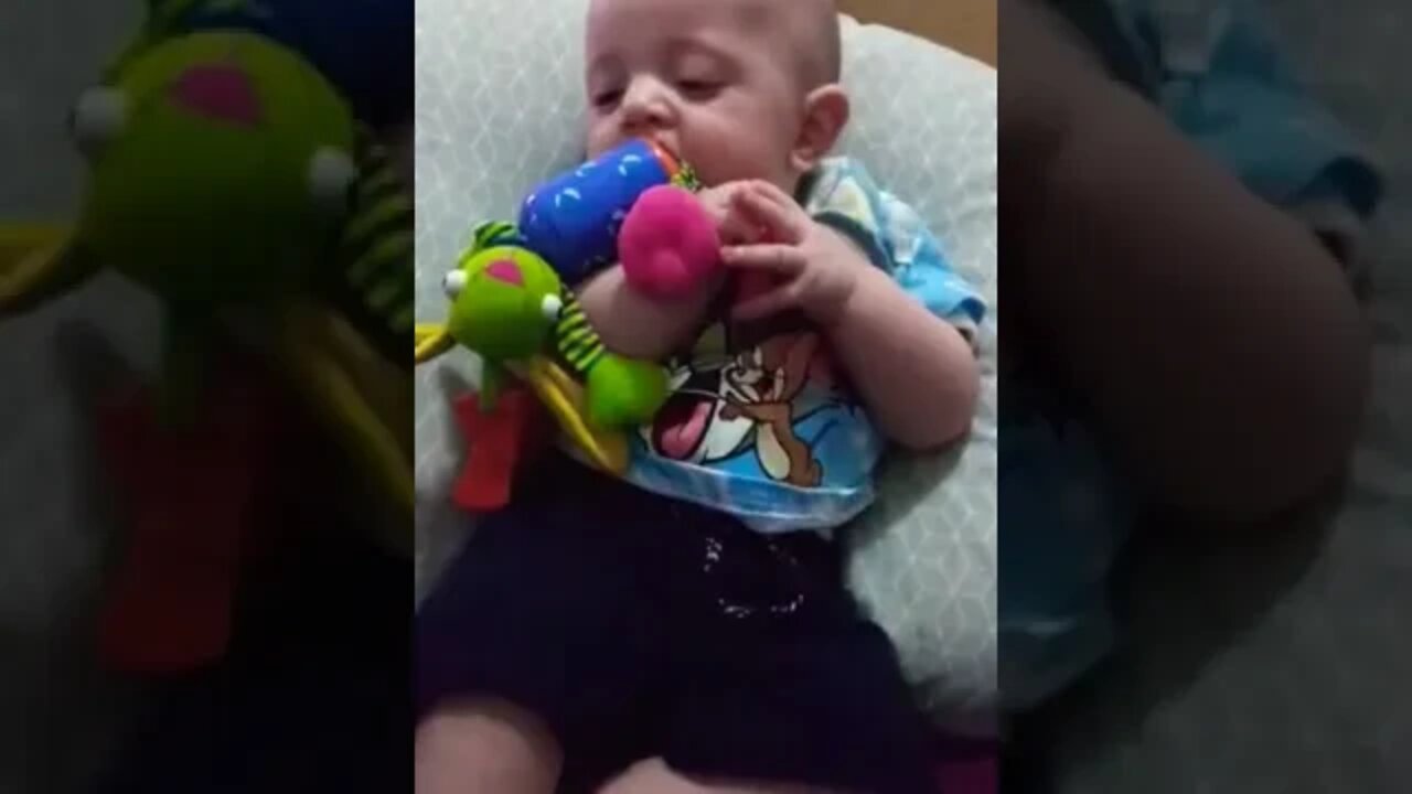 Cute Baby Boy Playing With His Toys