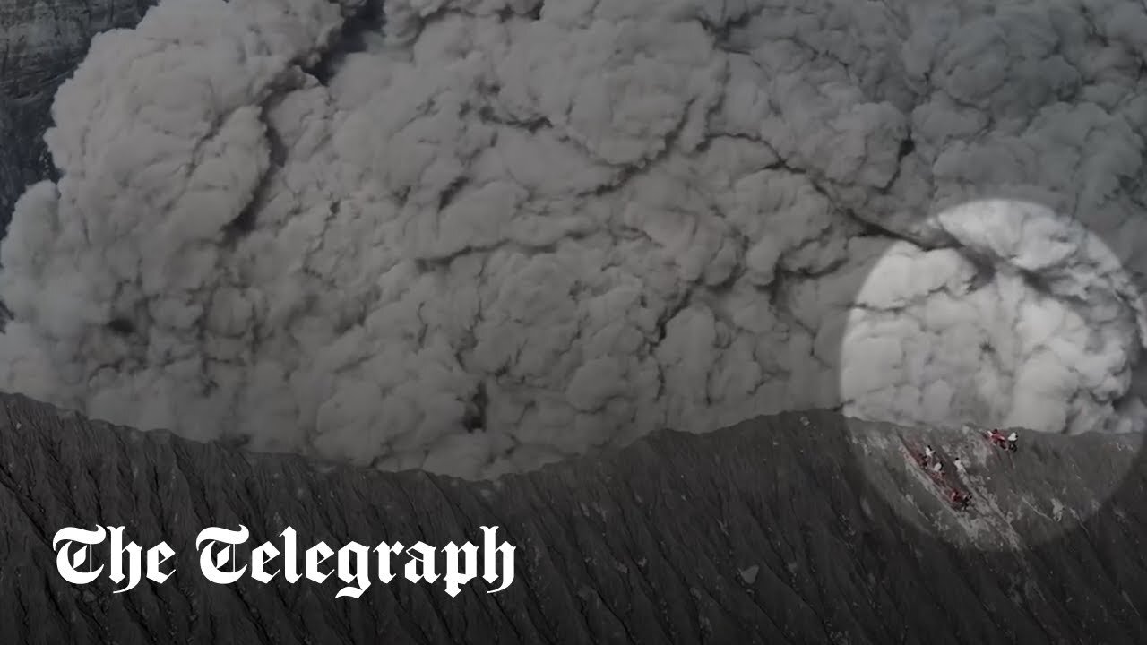 Moment climbers run for their lives as volcano erupts in Indonesia