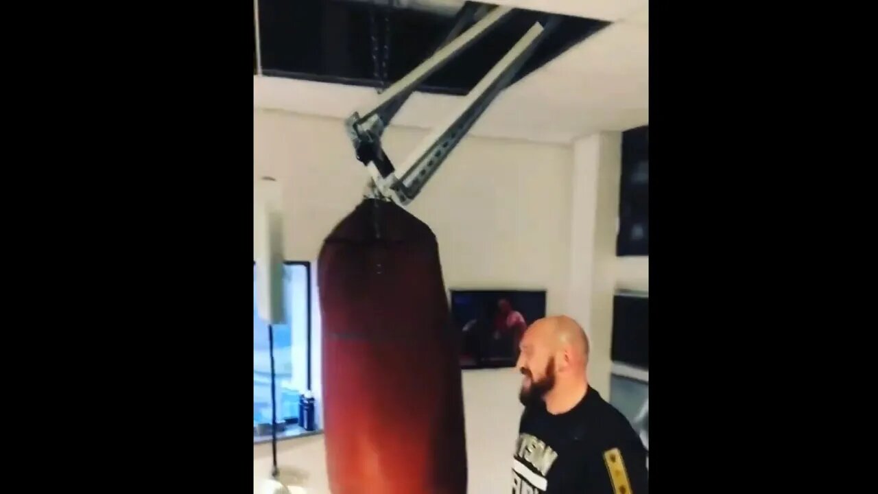 Tyson Fury punches heavy bag so hard he pulls the ceiling down in gym