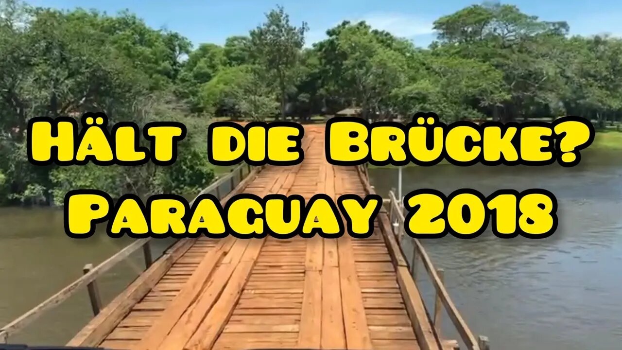 MAN F2000 fährt über Holzbrücke in Paraguay.