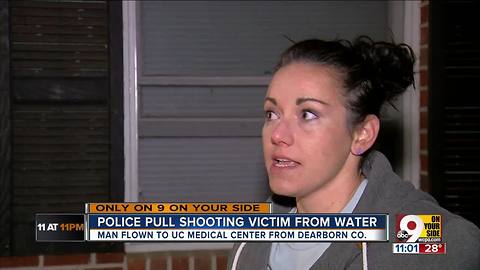 Woman discovers injured man in creek behind her home