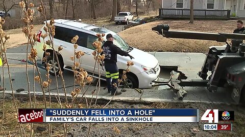 Car falls into a sinkhole