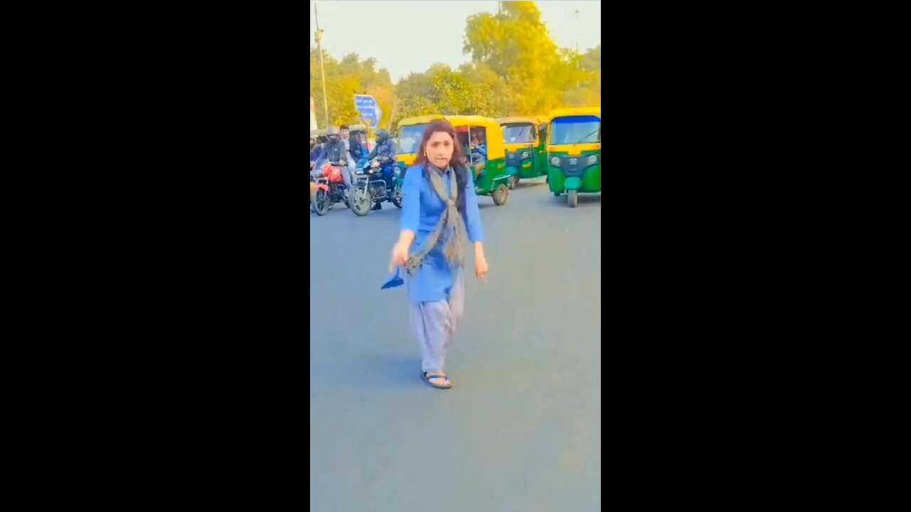 young lady dancing on the road