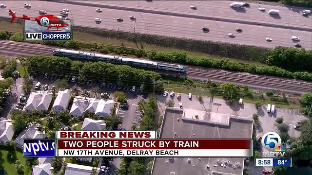 Two people struck by train