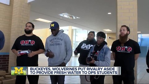 Buckeyes, Wolverines combine forces to bring water to DPS schools