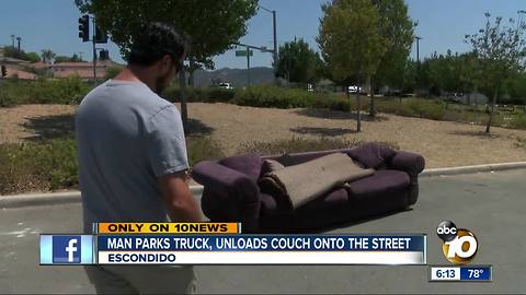 Caught on video: man leaves couch in street