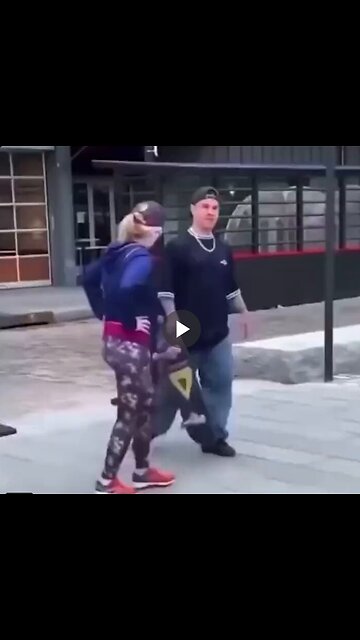 Woman tries to stop dude from skateboarding to "protect her city"