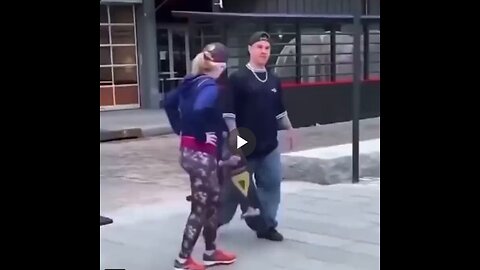 Woman tries to stop dude from skateboarding to "protect her city"