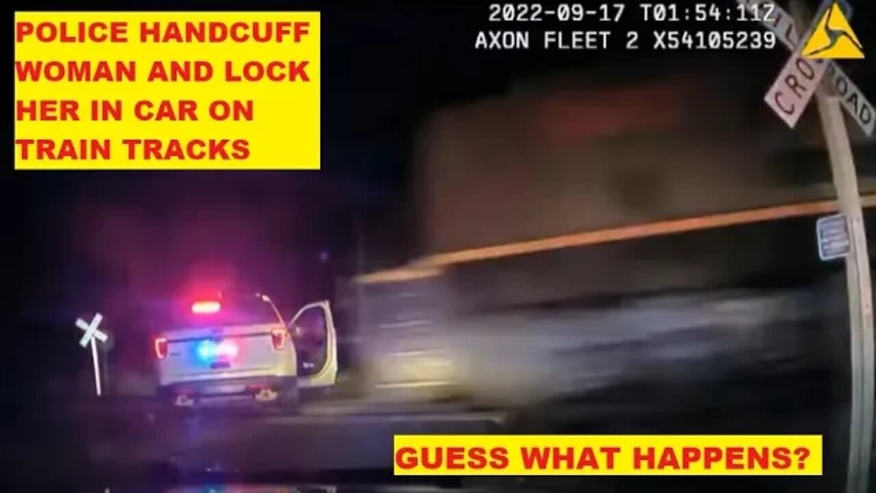 Fort Lupton Police Force Woman Into Police Car On Train Tracks - Train Comes Honks Horn Police Watch