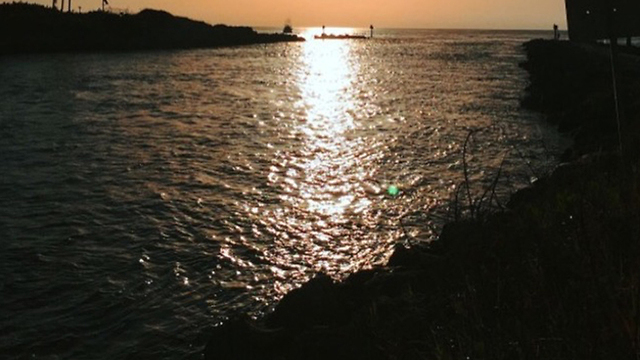 U.S. Coast Guard officials are searching for a missing male surfer off the Boca Inlet.