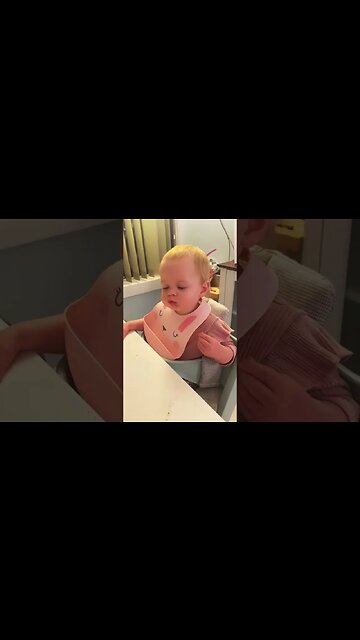 Babies First Bite of Pizza