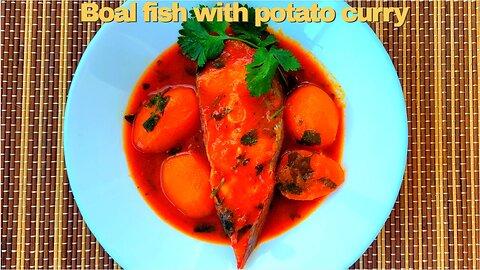 Boal fish with potato curry. আলুর তরকারি দিয়ে বোয়াল মাছ