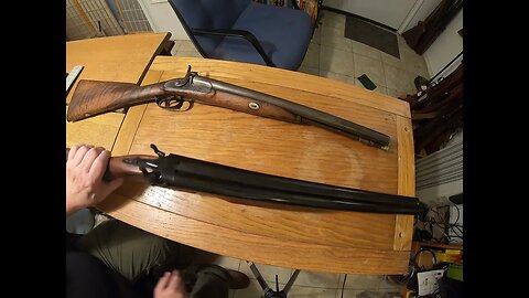 Two coach guns, one modern 12 gauge, one cap firing black powder.