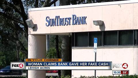 Woman says SunTrust gave her counterfeit money