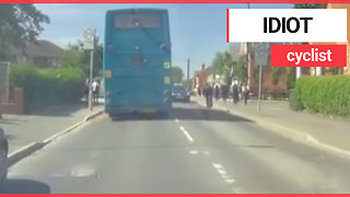 Teenage cyclist overtakes bus and cycles headfirst into moving car