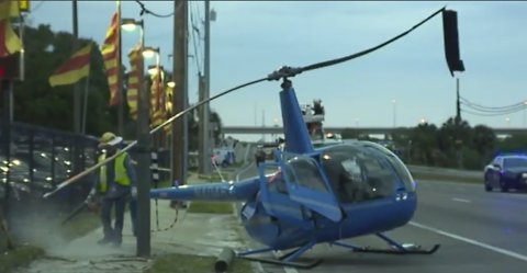 Surveillance video shows helicopter crash in Tampa