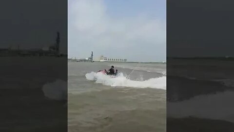 Mick and Wyatt on Jet Skies. Briana and I watching