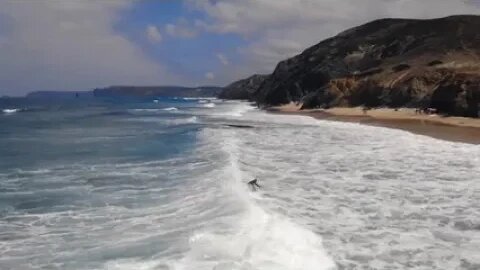riding the waves at the beach
