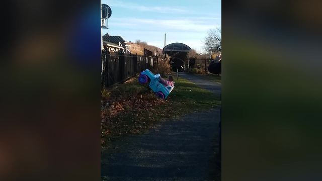 Tot Girl Rides In Her Power Wheels Car And It Tips Up In The Air