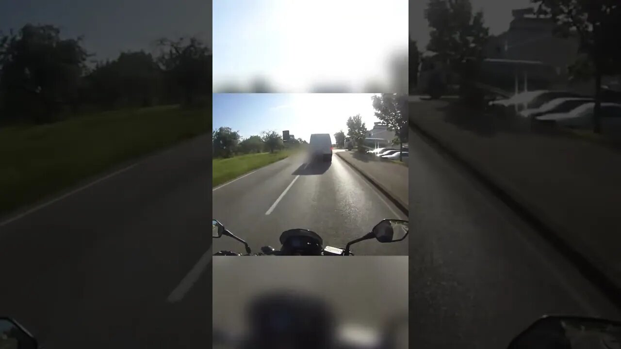 biker gets reversed into.