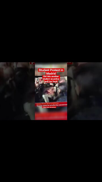 Madrid Police pull girl back after she hits another student #shorts