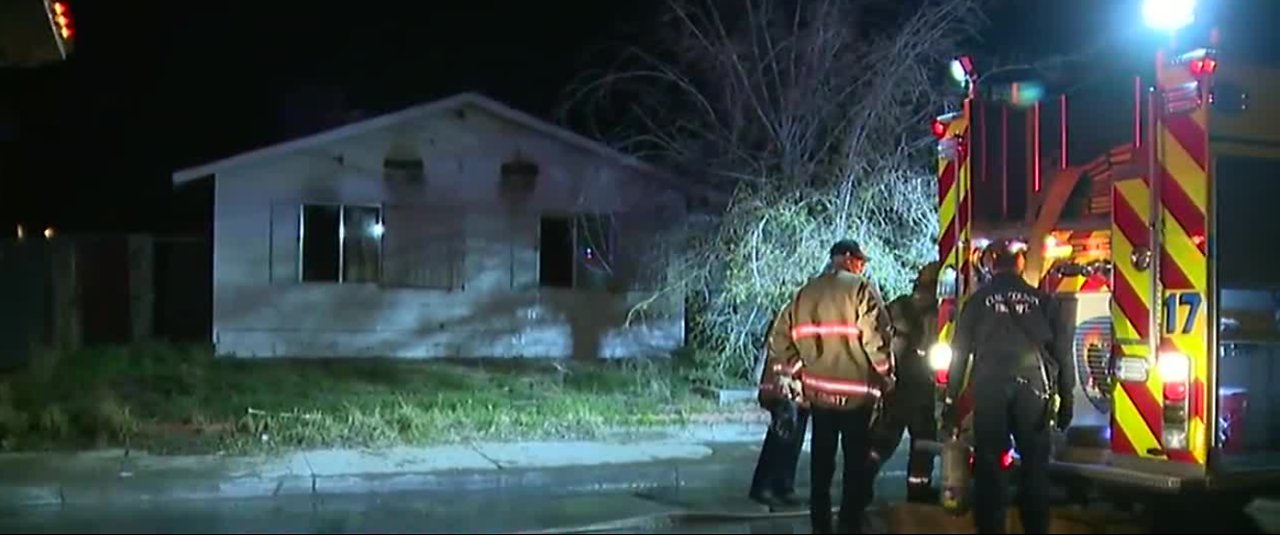 2 people hospitalized in house fire near Nellis and Tropicana