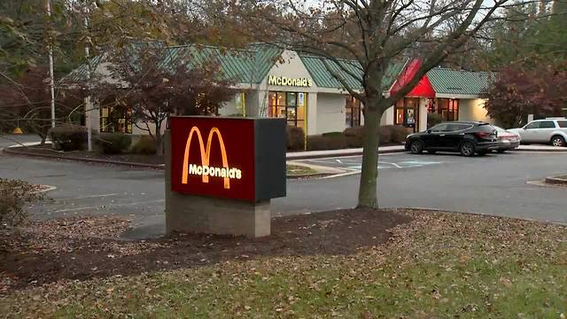 Woman breaks into McDonald's drive-thru window