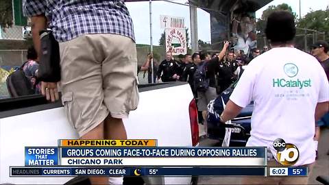 Groups coming face-to-face during opposing rallies
