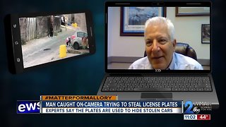 Man caught on-camera trying to steal license plates