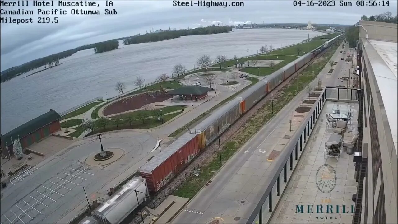 NB CPKC 261 Manifest with KCS Passenger Car on end at Muscatine, IA on April 16, 2023