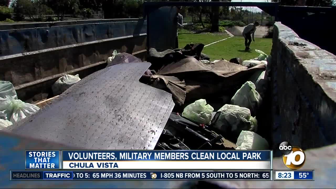 Volunteers, military members clean local park