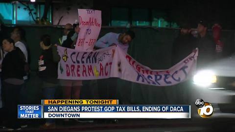 San Diegans protest GOP tax bills, ending of DACA